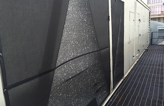 PreVent air intake screen installed on a rooftop HVAC unit for coil protection